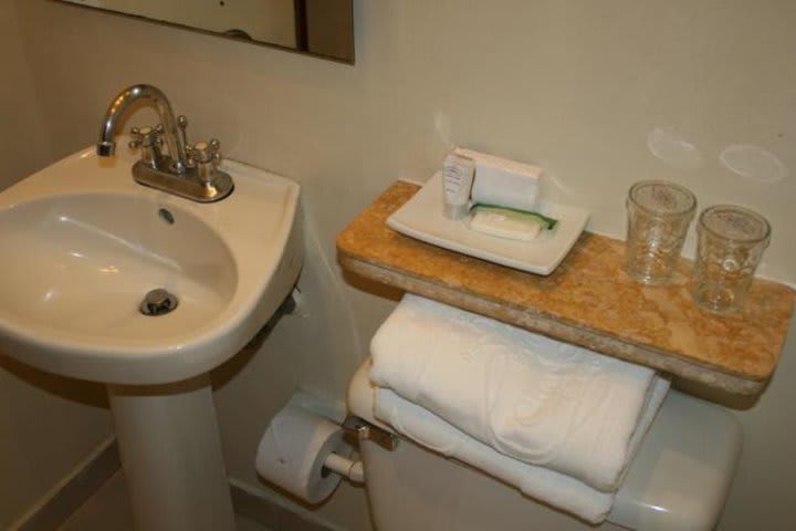 Guest rooms offer a private bathroom with shower