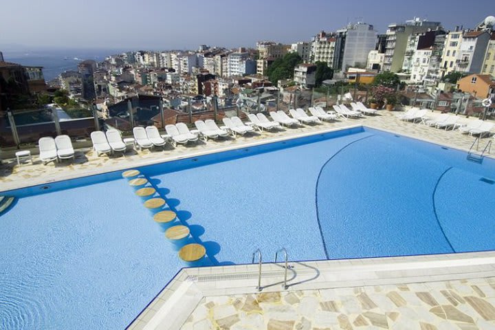 Sun terrace with sun loungers at The Marmara Taksim hotel