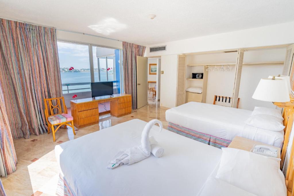 Suite con vistas al mar (3 adultos)