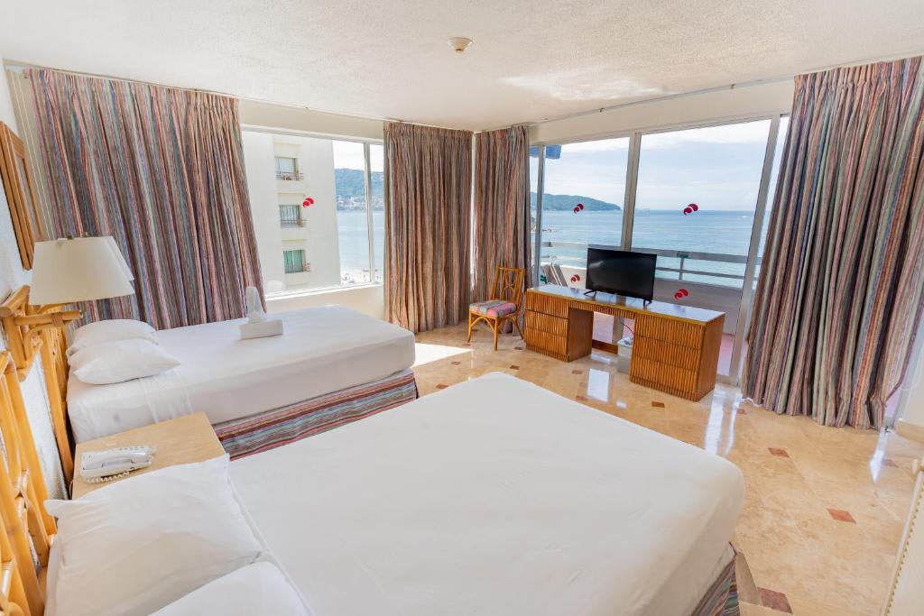 Suite con vistas al mar (3 adultos)