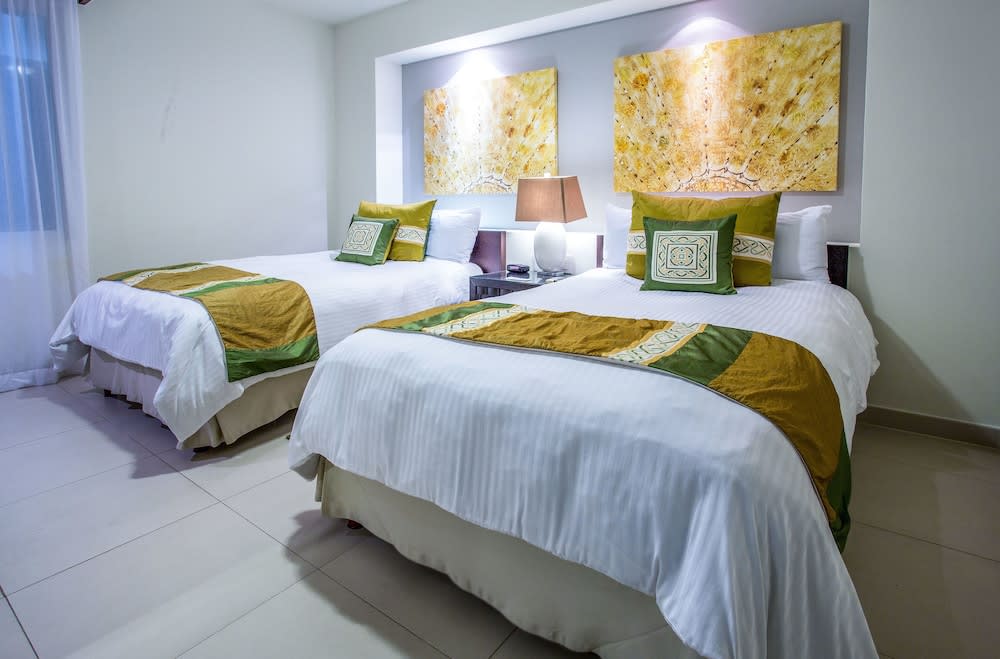 Img - Room, Multiple Beds, Kitchen (2 Balconies)