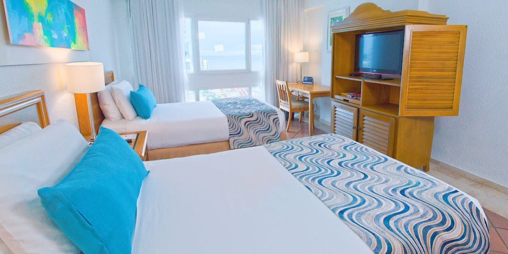 Img - Premium Room, Multiple Beds, Partial Ocean View