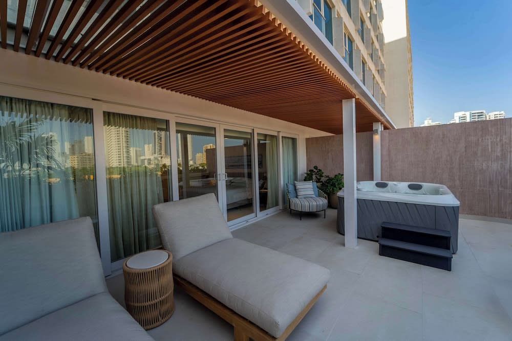 Img - Suite Premium, 1 cama King size, vista a la bahía