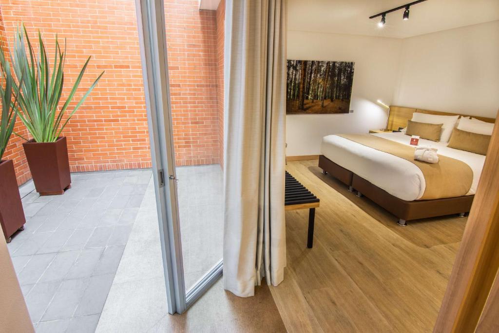 Suite con cama extragrande y terraza - No fumadores