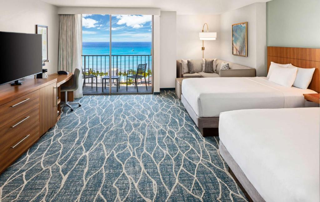 Specialty Queen Room with Two Queen Beds with Sofa Bed and Ocean View