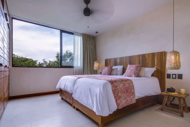 Beds in a 1-bedroom suite with terrace and jungle view