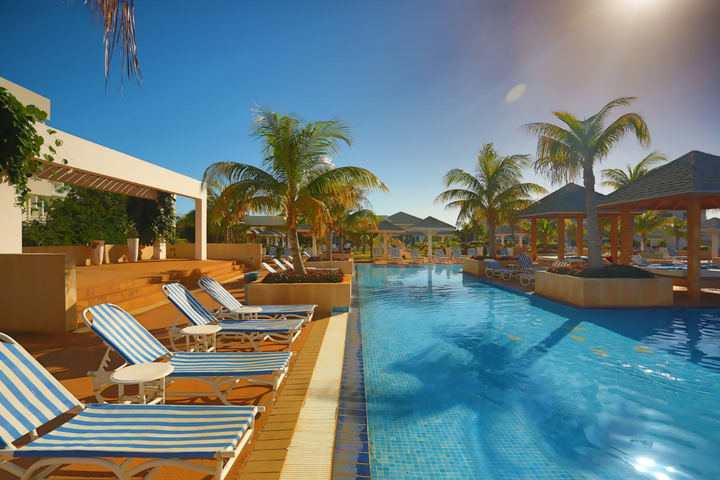 Pool area with sun loungers