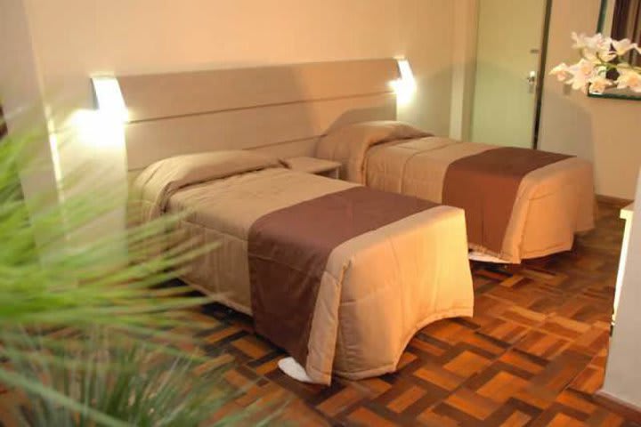 Some guest rooms at the Umbu Hotel have single beds