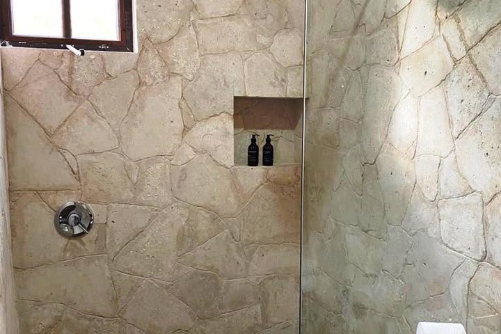 Guest rooms are fitted with private bathroom with rain shower