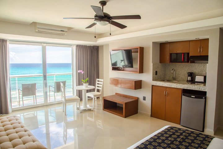 Deluxe guest room with a king size bed and ocean view