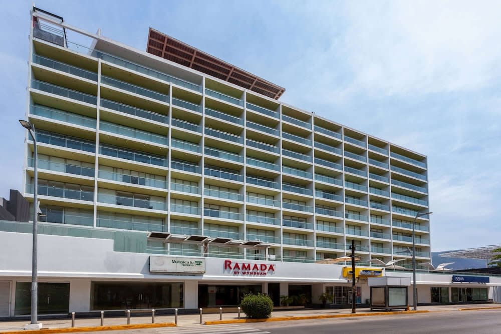 Ramada By Wyndham Acapulco Hotel & Resort before Residencial Playa Hornos