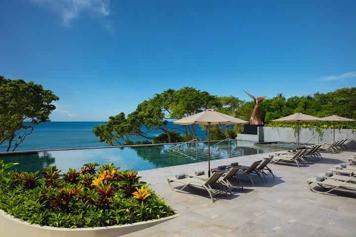 The pool overlooks the ocean