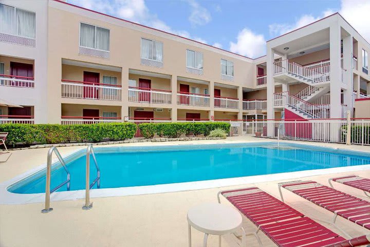 Sun loungers next to the pool