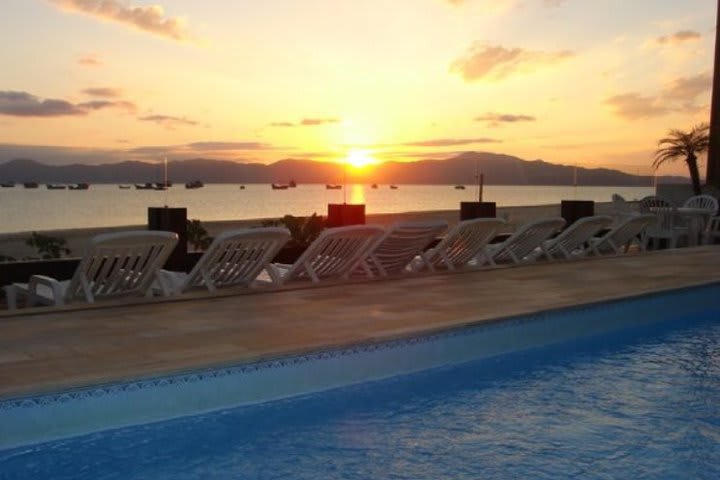 Dusk seen from the pool at Costa Norte on Ponta das Canas Beach
