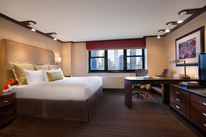 Guest room with a bed at the Affinia Dumont, hotel in Manhattan