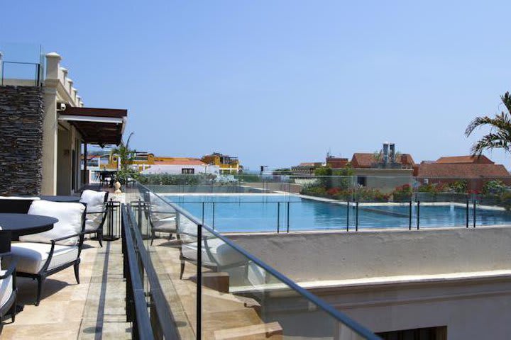 The building features a pool on the terrace on the fourth floor