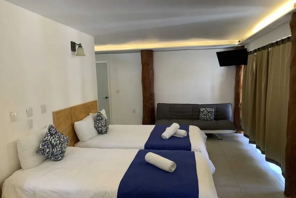 Img - Habitación Deluxe, 2 camas dobles, vista al jardín