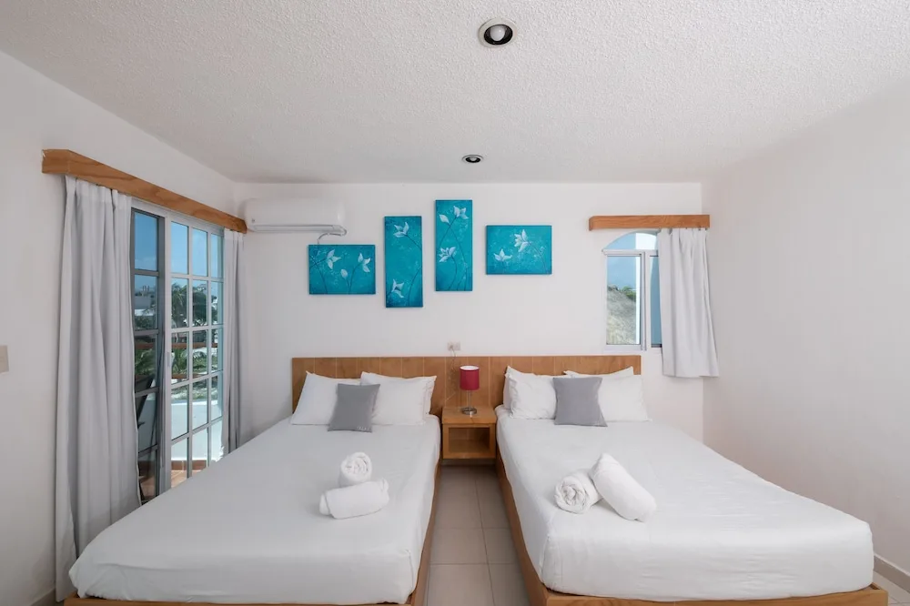 Img - Habitación Deluxe, 2 camas dobles, vista parcial al océano