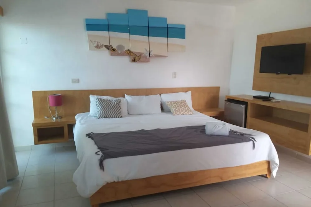 Img - Habitación Deluxe, 1 cama Queen size, vista parcial al océano