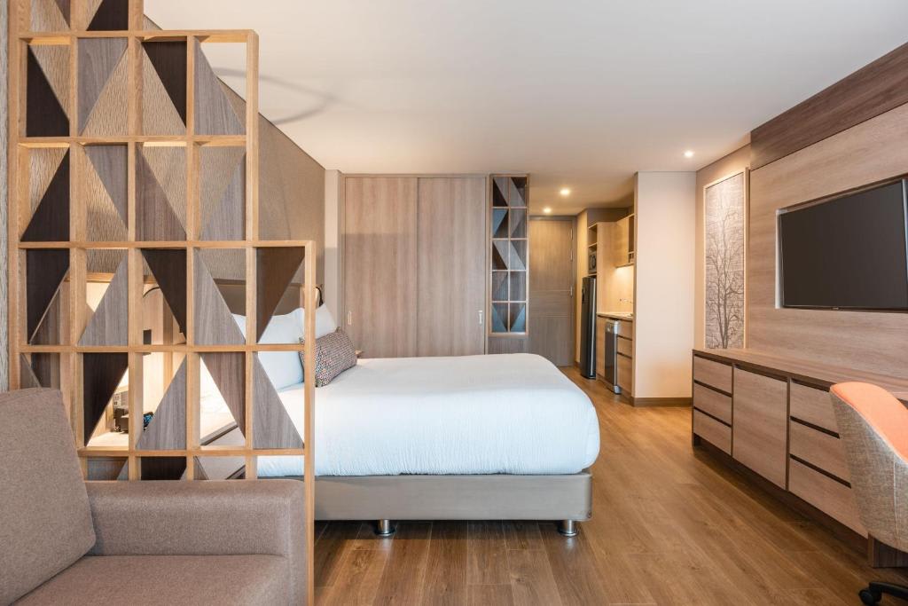 Suite Estudio con 1 cama extragrande, sofá cama y vistas a la ciudad