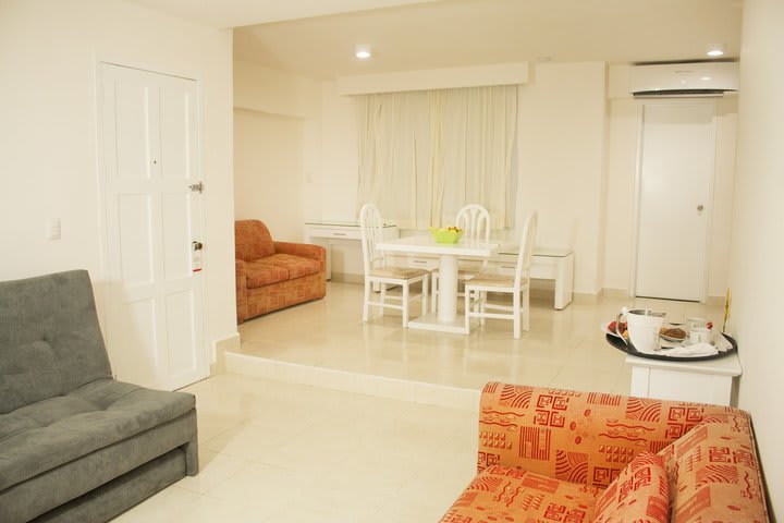 Sitting area in a room with garden view