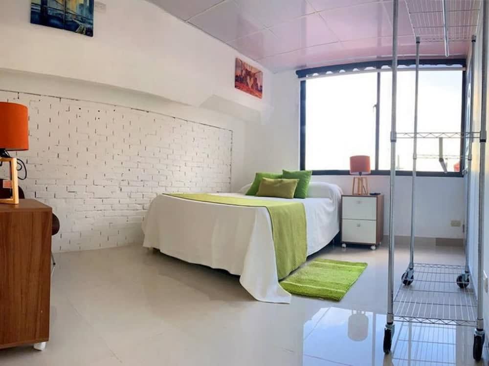 Room in Condo - Malecon Premium Rooms