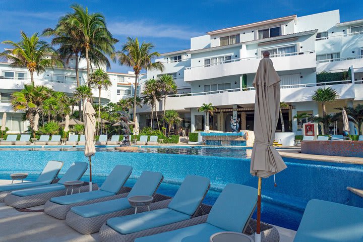 Sun loungers next to the pool