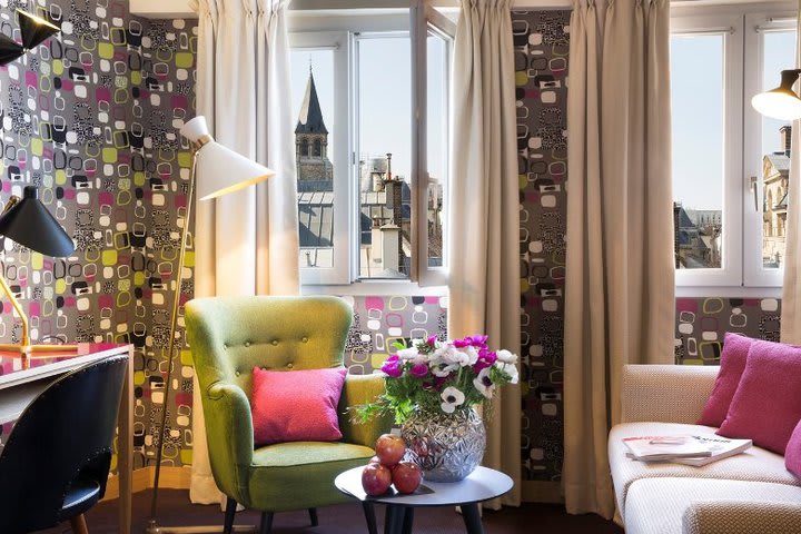 The exclusive suite at the Artus hotel in Paris has a sitting area