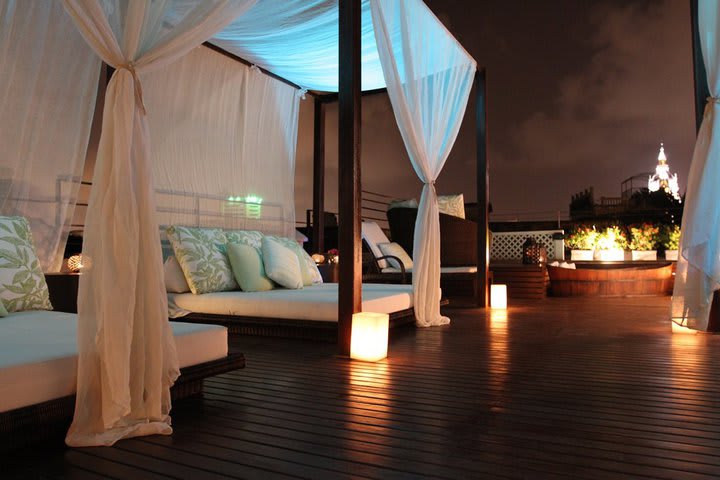 Lounge-style armchairs on the terrace