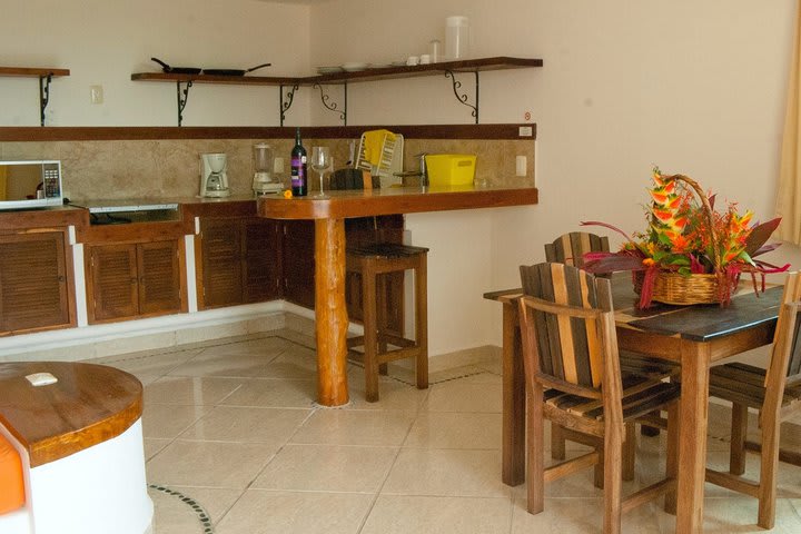 Dining area and kitchen in a room