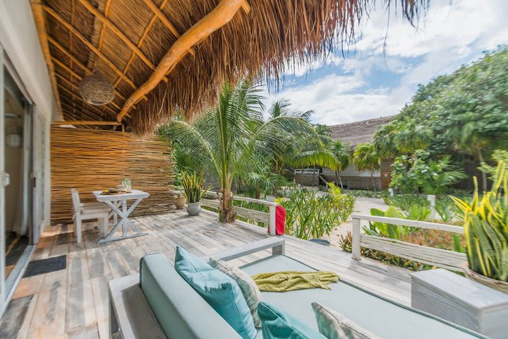 Terraza de una habitación con vista al jardín