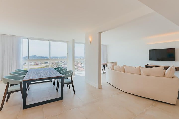 Dining area and TV room of a penthouse