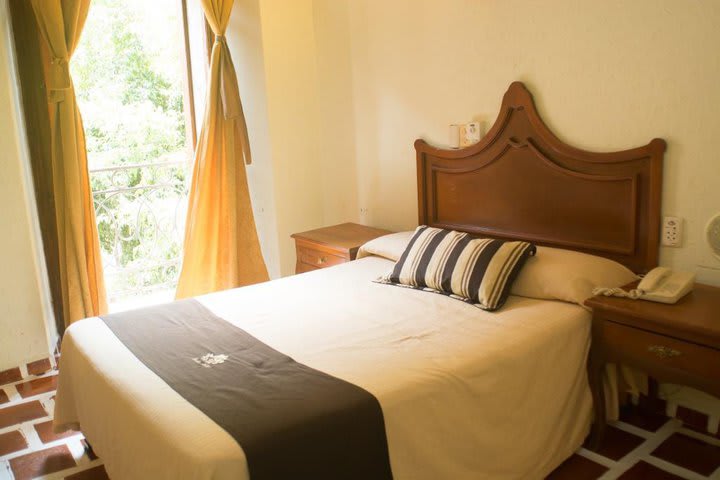 Guest room with exterior view at Hotel Francés in Guadalajara