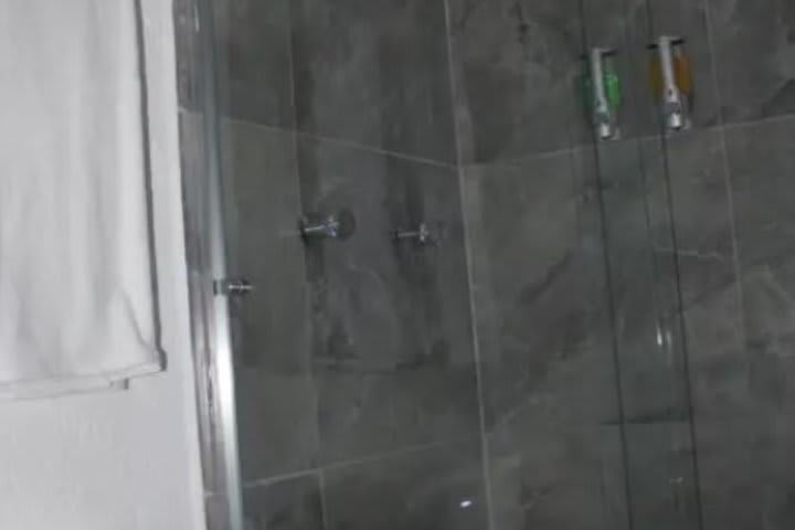 The shower in a guest bathroom