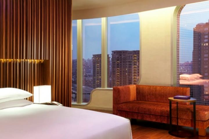 Guest rooms at the Andaz Shanghai hotel have a sitting area