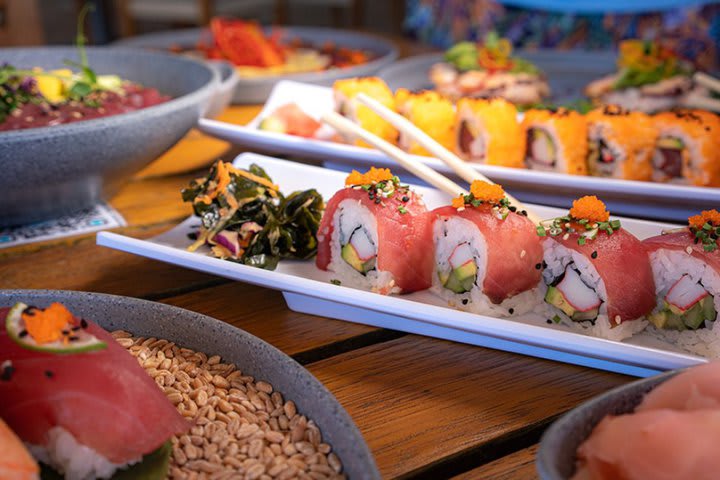 The restaurant serves sushi, Mediterranean cuisine, and seafood