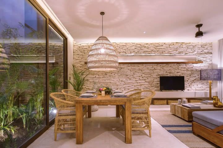 Sitting area in a suite with terrace and jungle view