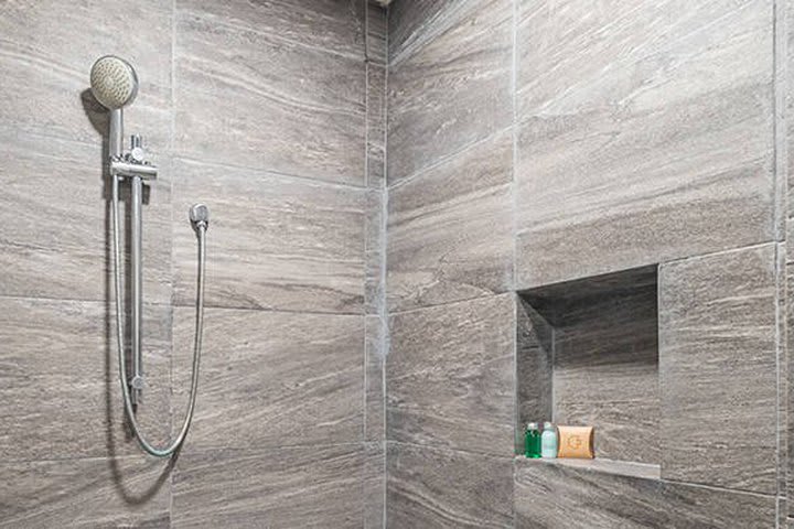 Shower in a deluxe guest room