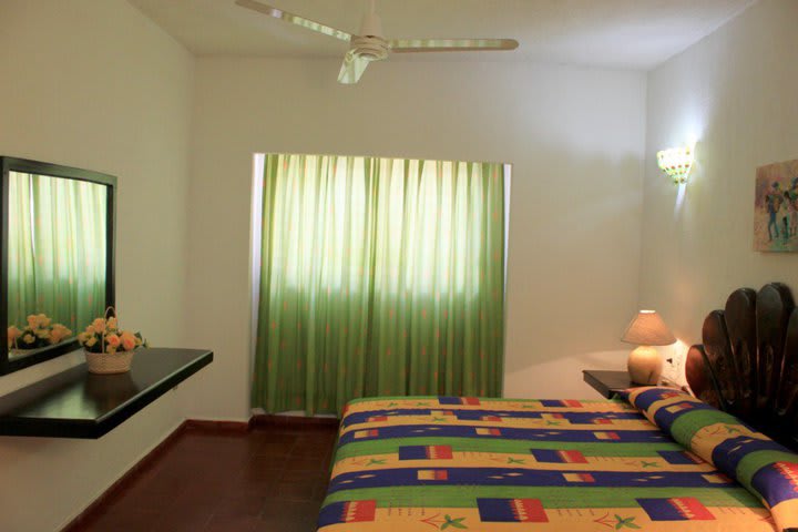 Bedroom in a junior suite with balcony