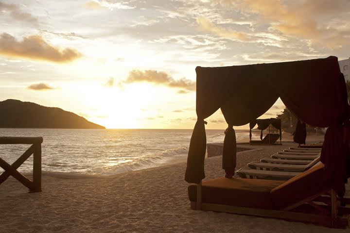 Oceanfront hotel with panoramic view of two islands