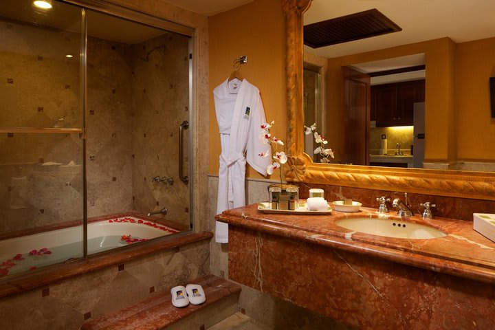 The bathroom offers amenities and robes