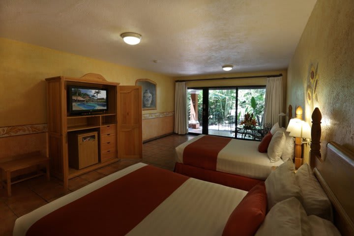 Guest rooms at Hosteria las Quintas hotel have a flat-screen TV