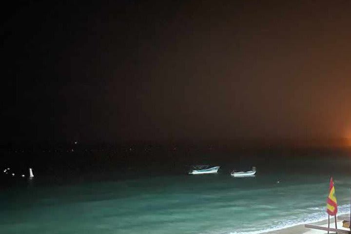 View of the beach at night