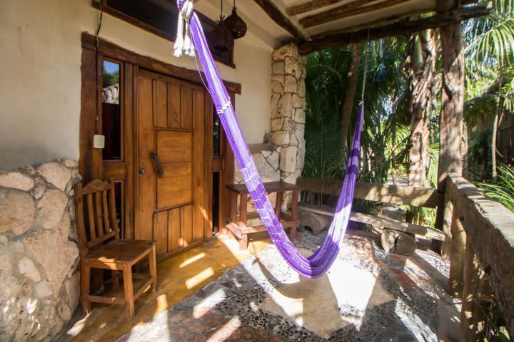 Terraza de una habitación con vista al jardín