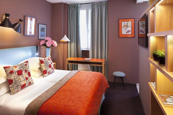 Superior guest room with colorful decor at the Artus Hotel