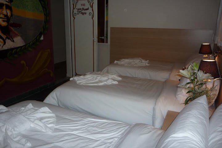 Triple guest room at the Ayres Portenos hotel in Buenos Aires