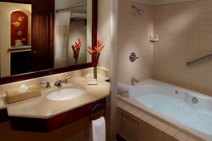 Guest bathrooms have marble finishes and offer toiletries