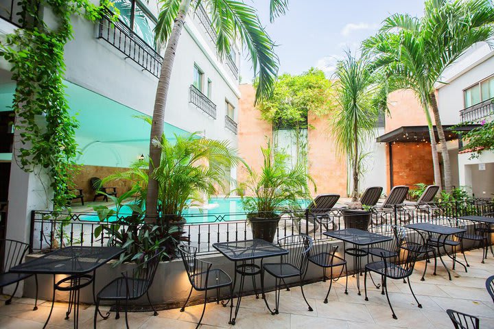 Tables surrounding the pool