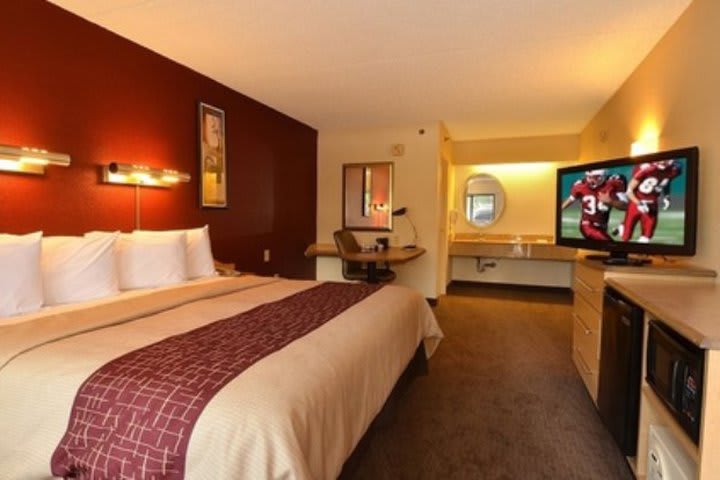 Guest rooms at the Red Roof Inn San Antonio have a flat-screen TV