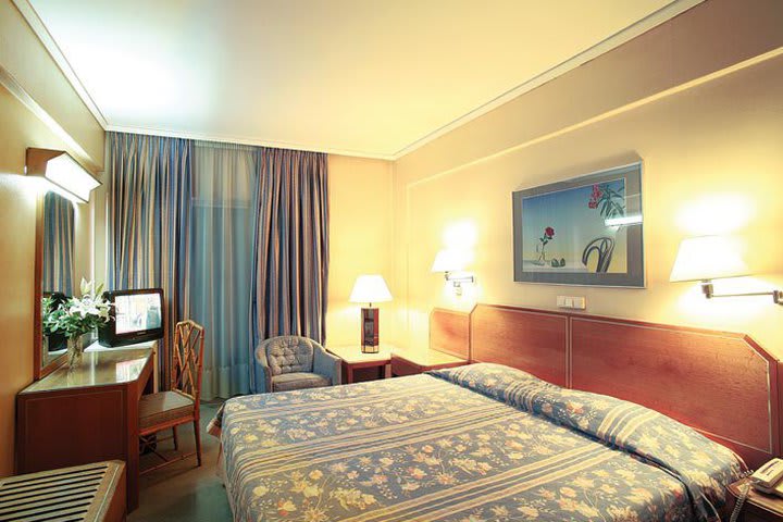 Guest room with one bed at the Ionis hotel near the Acropolis of Athens